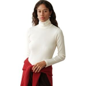 DONNI. Cream Ribbed Turtleneck